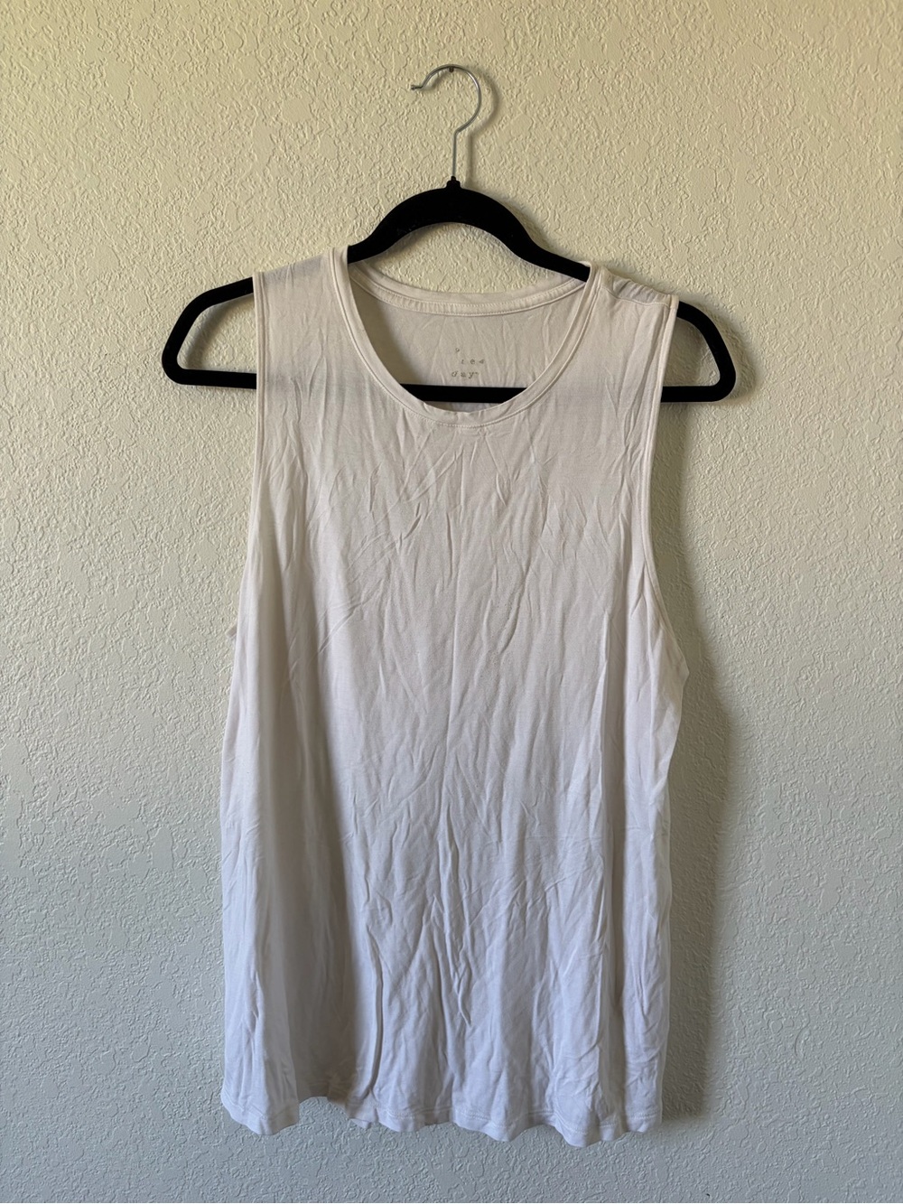 a new day White Muscle Tank Top